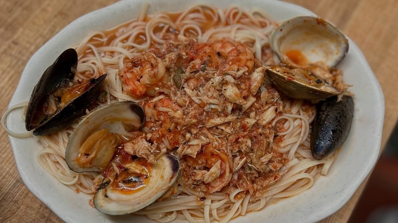 a plate of seafood pasta