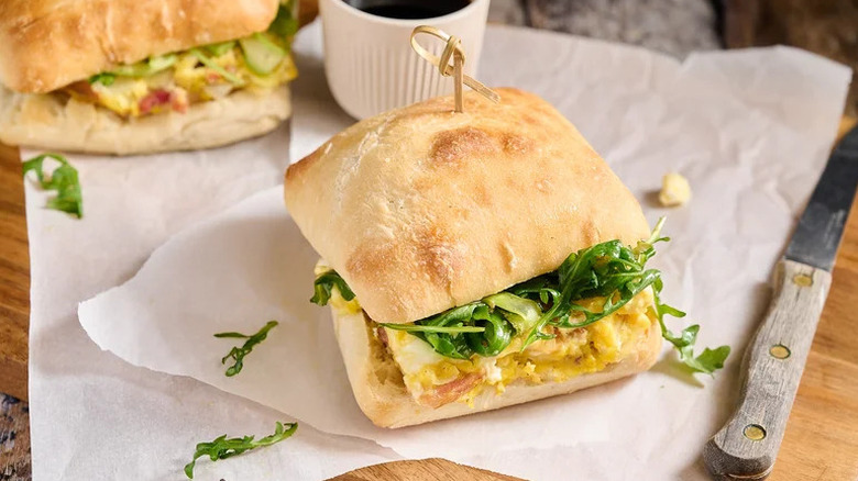 Bacon-Goat Cheese Frittata Sandwich on parchment paper
