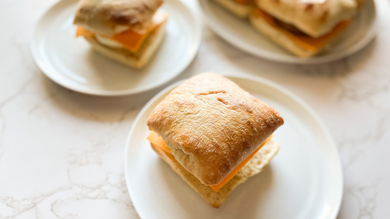 Copycat Starbucks Impossible Breakfast Sandwiches on white plates