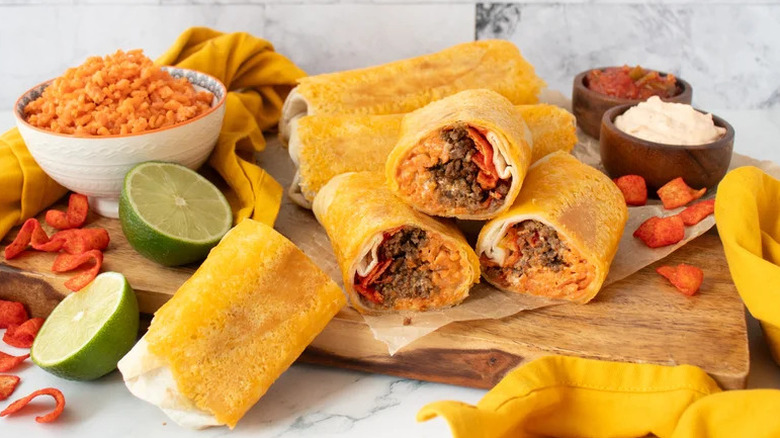 'Better Than Taco Bell' Flamin' Hot Grilled Cheese Burrito on wooden board