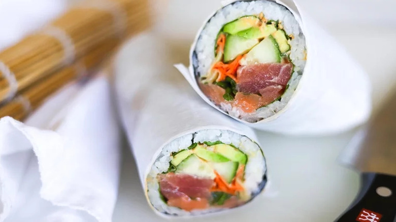 Ginger Sushi Burrito wrapped in white paper