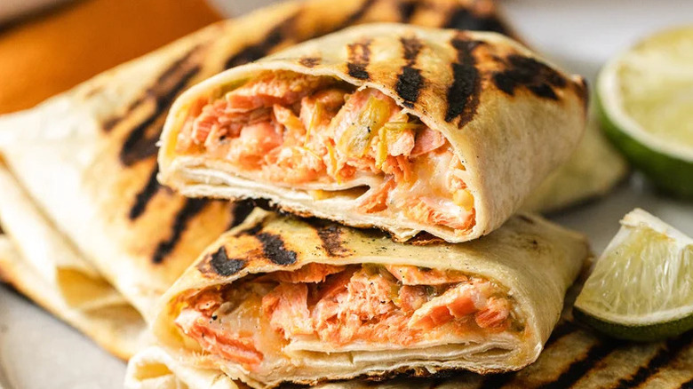 Grilled Salmon Burrito with char marks and lime
