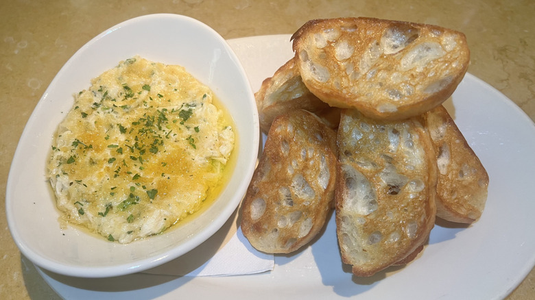 Warm Crab Dip with crostini on plate