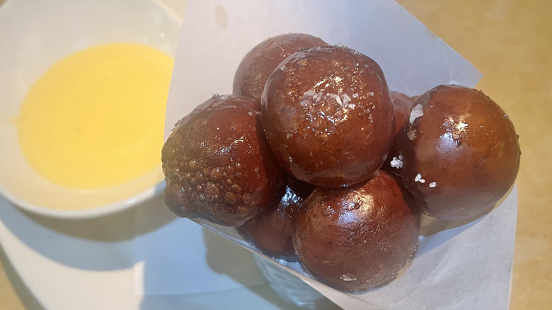 A container of Pretzel Bites with Cheddar Cheese Fondue