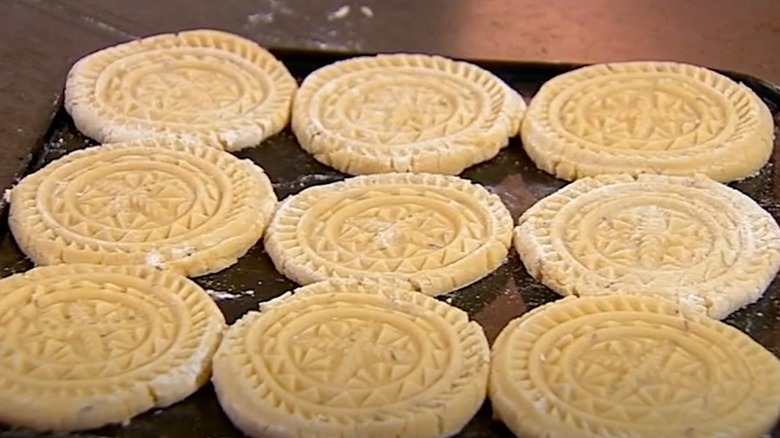 Traditional funeral biscuits on baking sheet