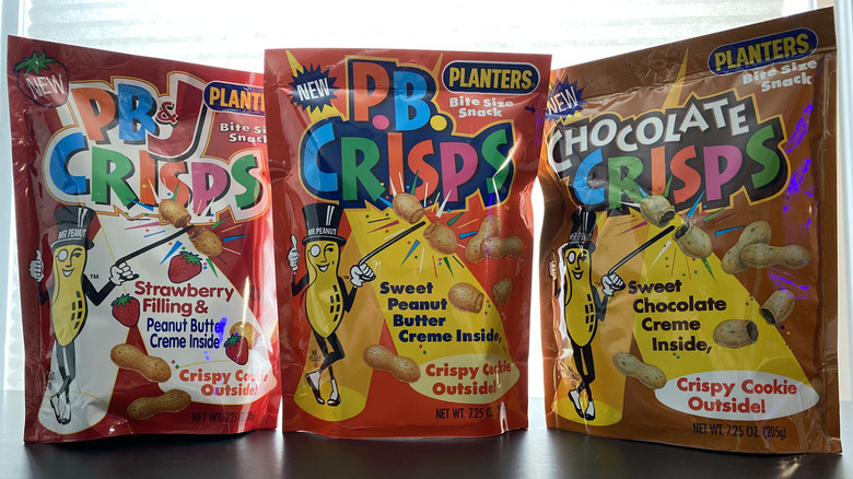 Three packages of different flavored PB Crisps.