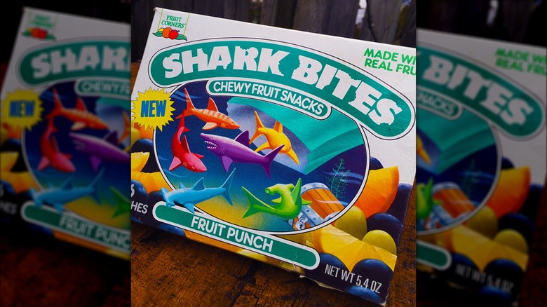 A close-up of Shark Bites fruit snacks box.