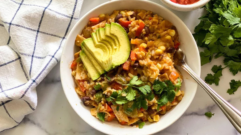 15-Minute One-Pot Stovetop Enchiladas in white bowl on table