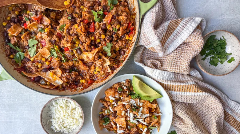 Turkey Enchilada Skillet in white bowl and skillet