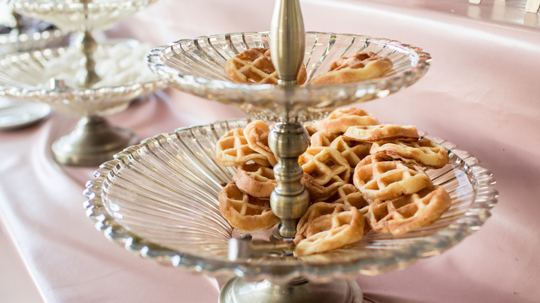 silver stand placed on table