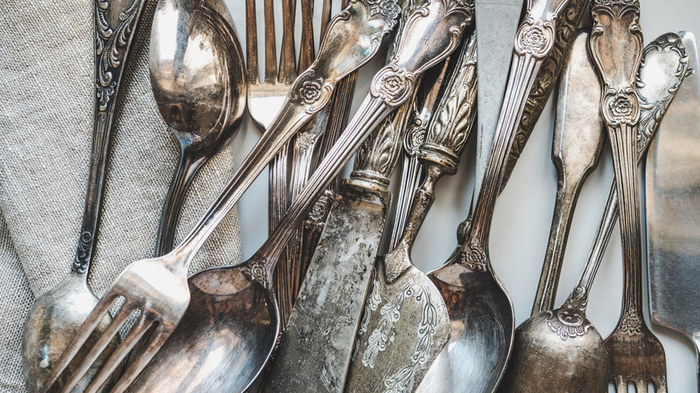 vintage silverware set on table