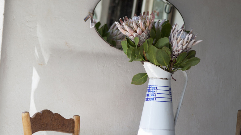 floral pitcher set on table