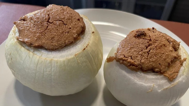 Peanut butter-stuffed onions on a plate