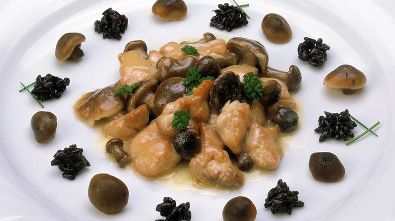 Sweetbreads and mushrooms on a plate