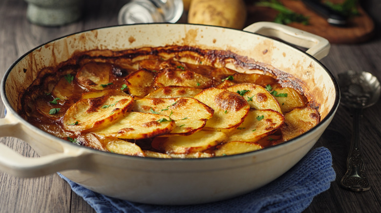 A dish containing Lancashire hotpot placed on a table cloth