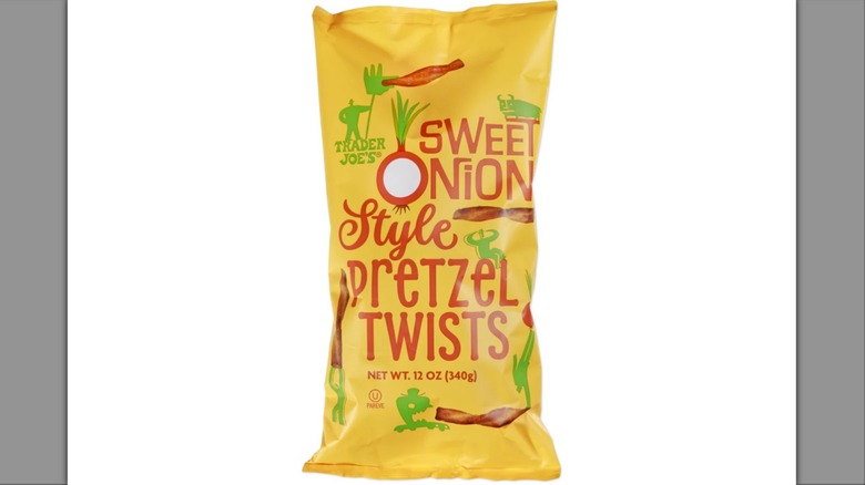 Yellow bag of Trader Joe's Sweet Onion Style Pretzel Twists on white background