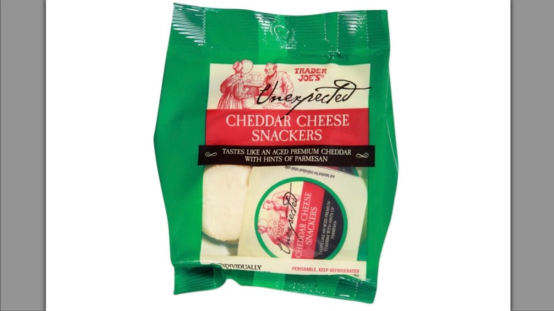 Bag of Trader Joe's Unexpected Cheddar Cheese Snackers on white background