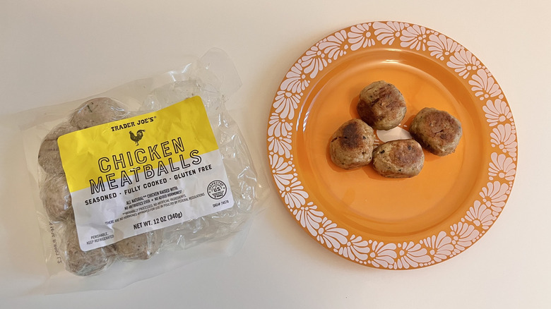 Prepared Trader Joe's Chicken Meatballs packed and on plate