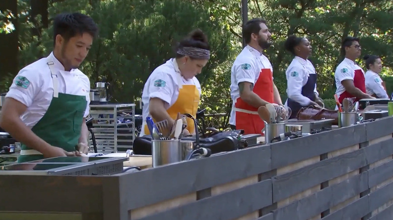 Top Chef contestants competing in a challenge