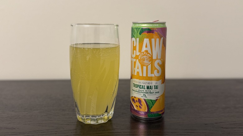 Tropical Mai Tai White Claw Clawtail in a glass and a can.