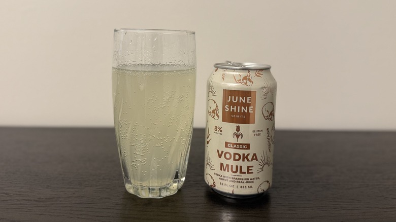 Vodka Mule JuneShine in a glass and a can.