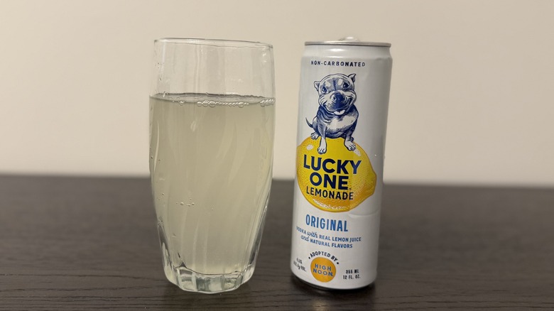 Original Lucky One Vodka Lemonade in a glass and a can.