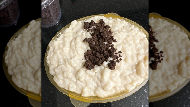 Bowl of rice pudding with cookie crumbles from Rice To Riches