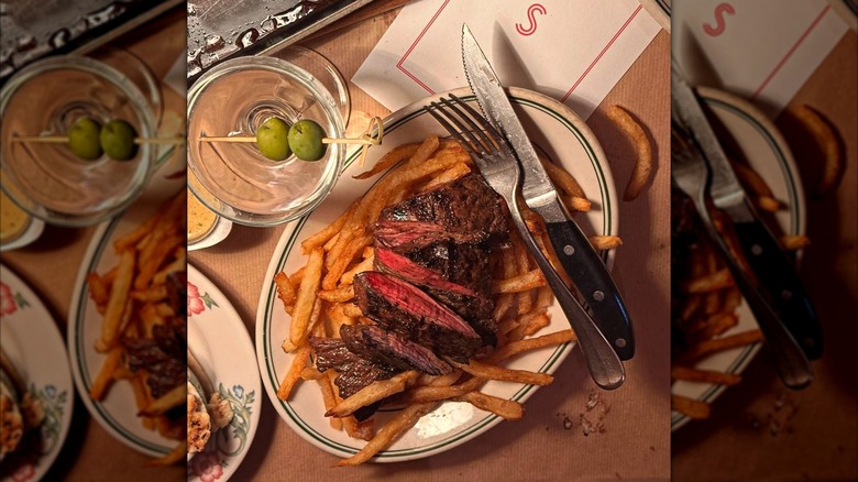Plate of steak and fries at Skirt Steak