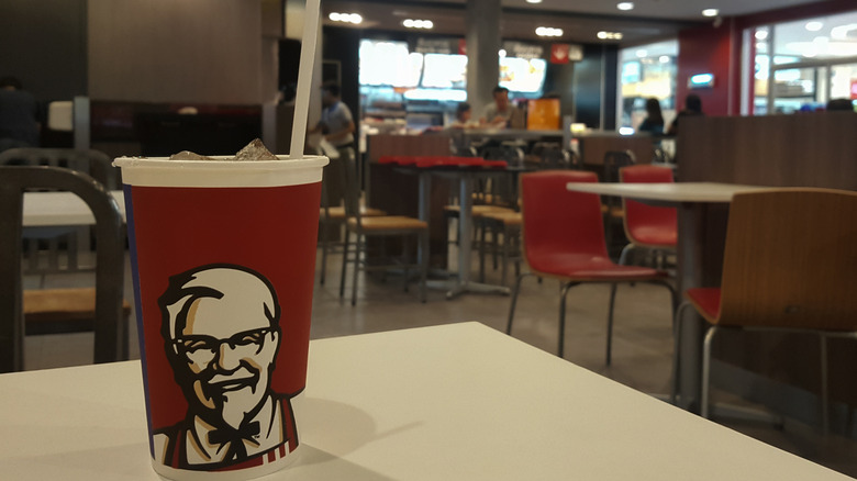 Extra-large bucket of soda on table at KFC