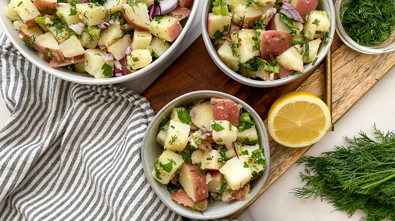Herby red potato salad served into bowls