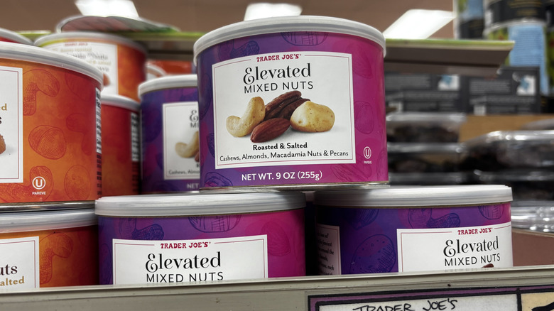 Trader Joe's elevated mixed nuts containers on shelf