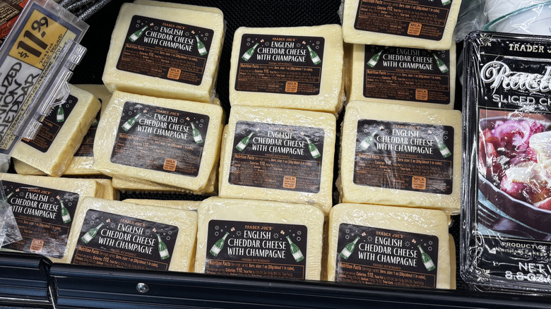 Trader Joe's English Champagne cheddar cheese stocked on shelf