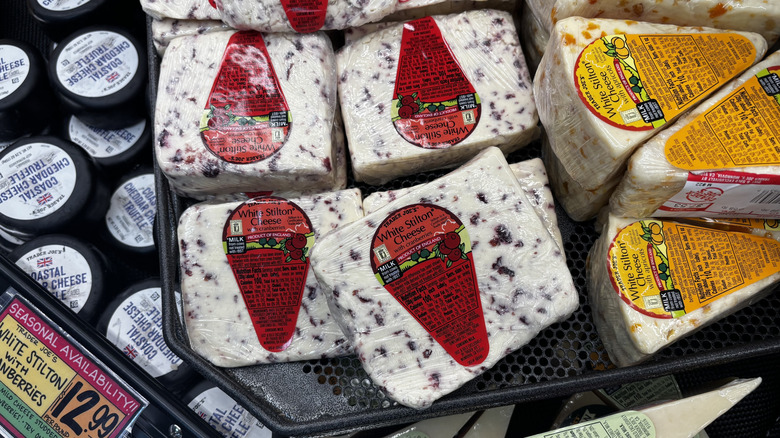 Trader Joe's cranberry white stilton cheese blocks on shelf