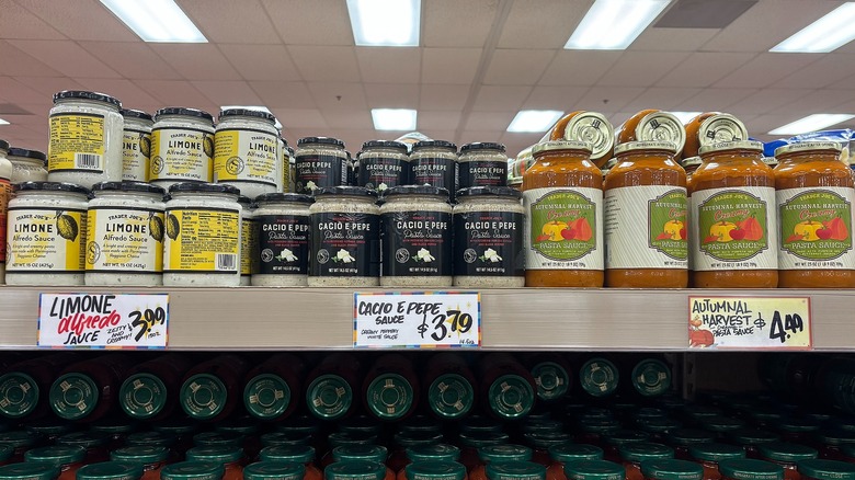 Jars of Trader Joe's pasta sauces on shelf in store