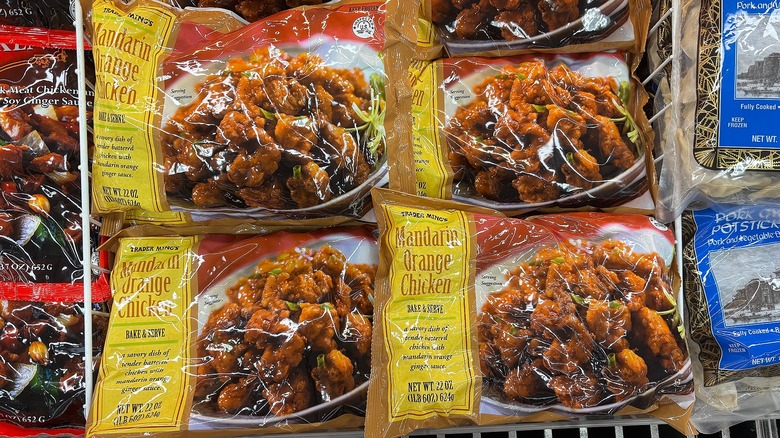 Bags of Trader Joe's Mandarin orange chicken in store freezer