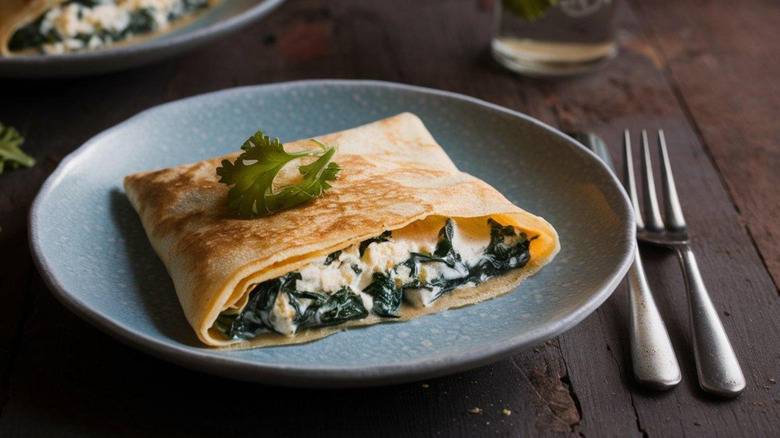 blue plate with Crespelle alla Fiorentina