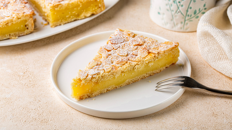 slice of Torta della nonna on white plate