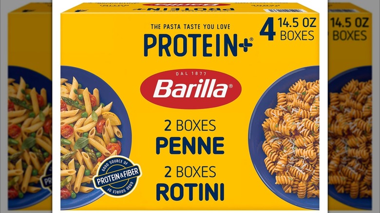 Box of pasta showing one bowl of penne and one bowl of rotini