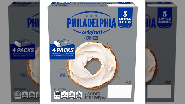 Package of Philadelphia cream cheese with illustration of bagel covered in cream cheese