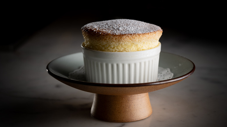 A fluffy soufflé in a ramekin