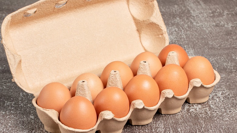 Egg carton with brown eggs