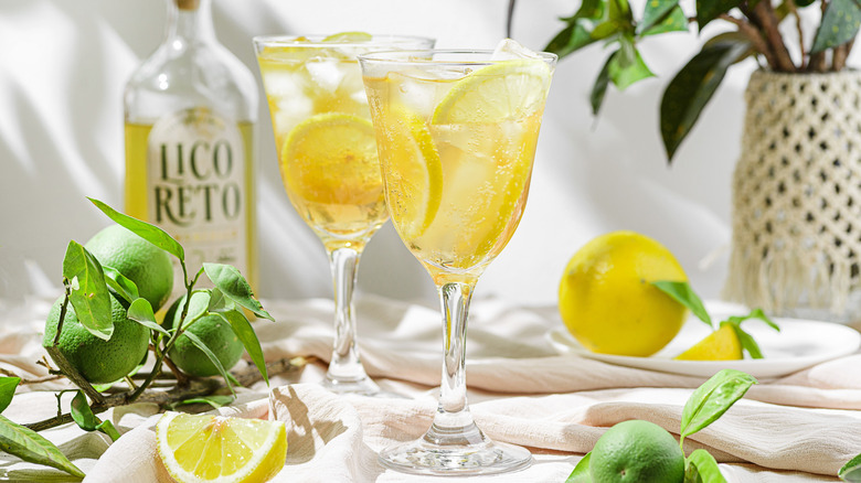 Limoncello spritz in glass with lemon