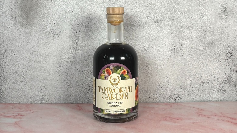 Bottle of Tamworth Garden Sierra Fig Cordial on grey wall background