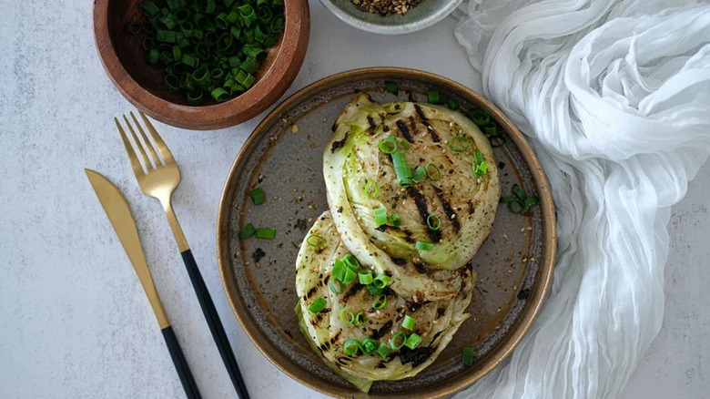 Grilled Cabbage Steaks with Furikake on grey plate