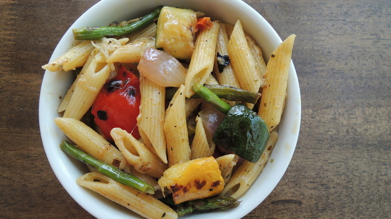 Grilled Summer Vegetable Pasta Salad in white bowl