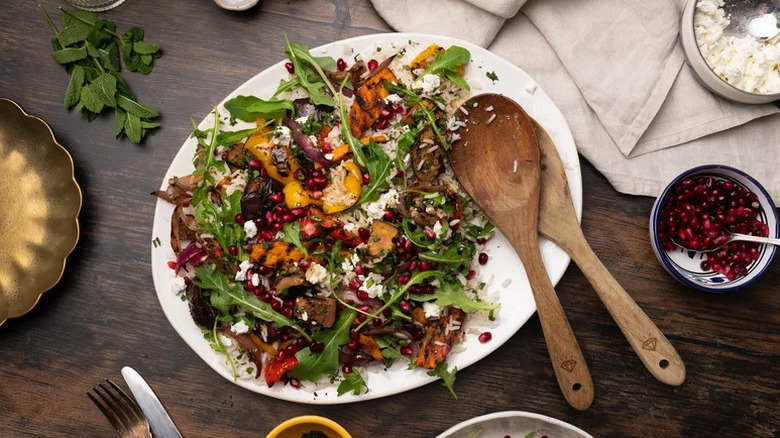 Grilled Summer Vegetable Salad with Jasmine Rice on white plate with wooden spoons