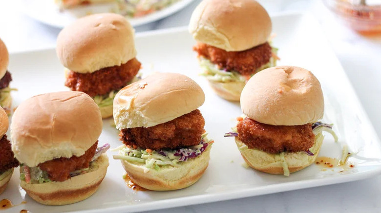 Fried Chicken Sliders with Simple Slaw and Hot Honey on white plate