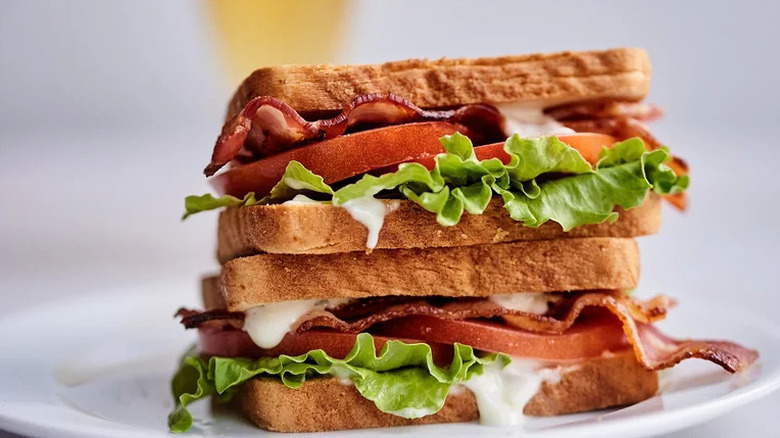 Sweet Heat BLT stacked on white plate