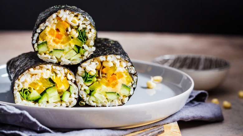 Three vegan sushi on plate