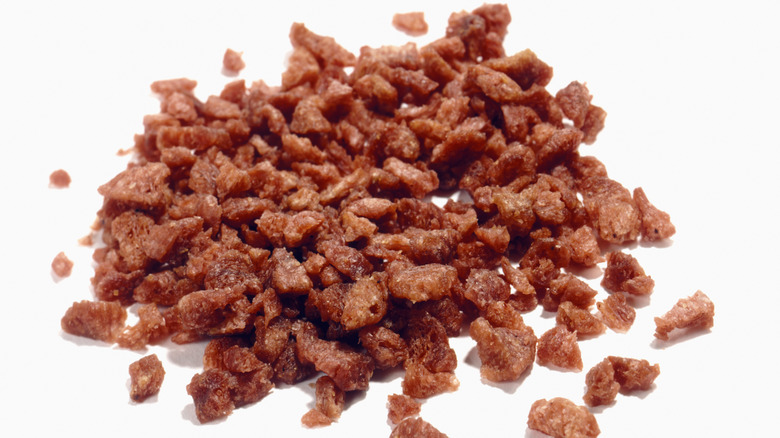 Bacon bits on white background